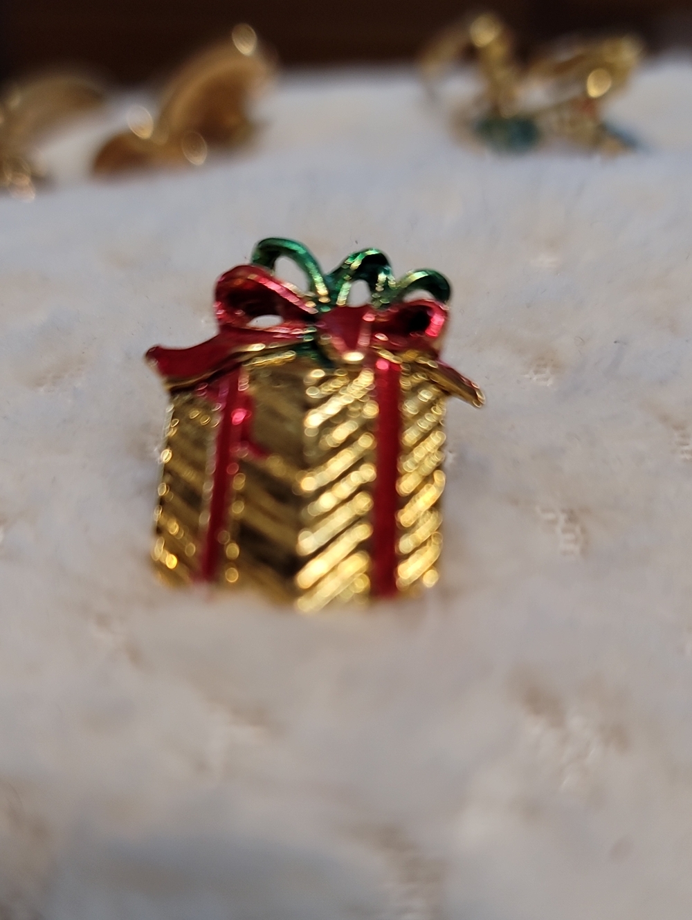 Golden Holiday Present Lapel Pin with Red and Green Bow